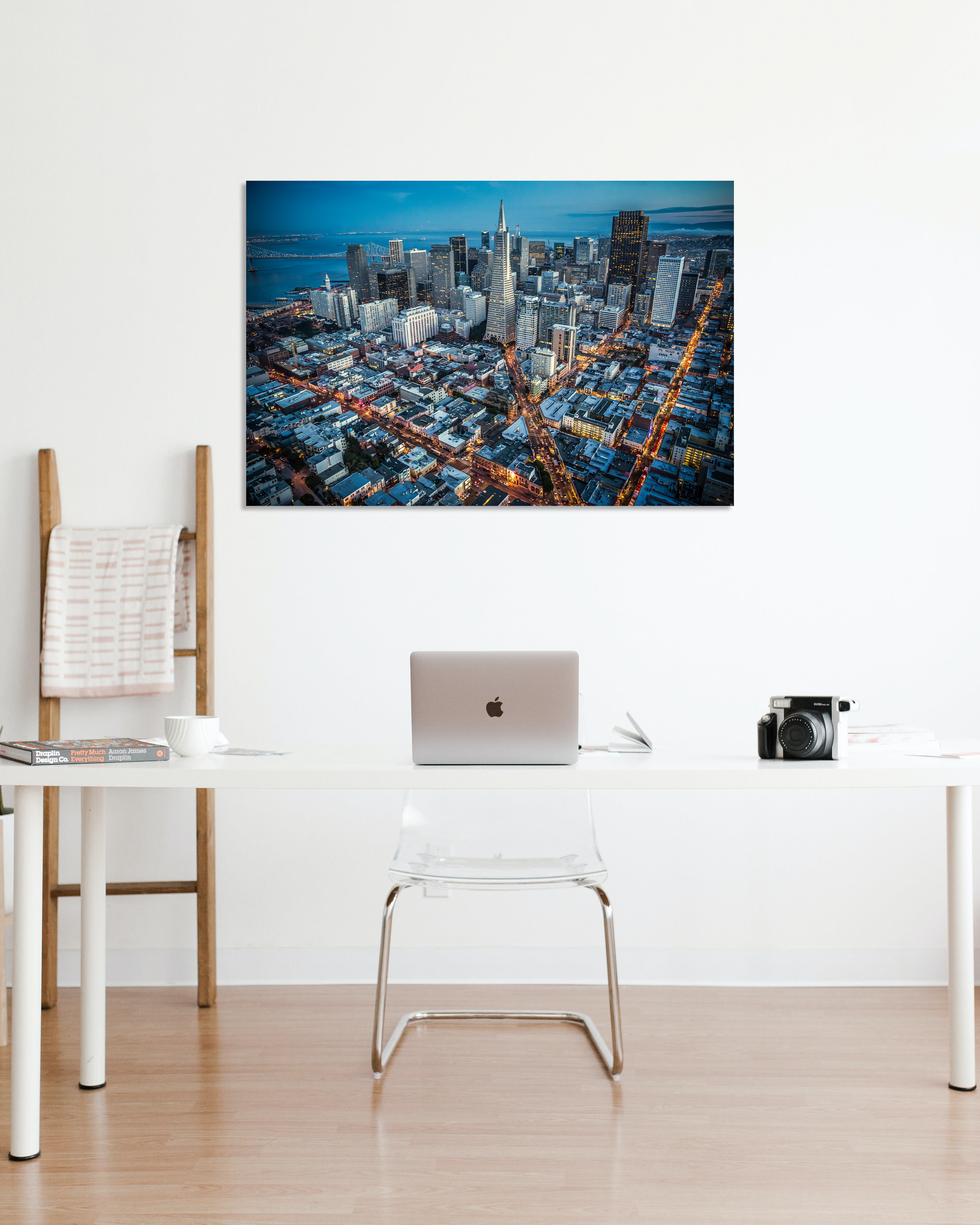 An image above the streets of San Francisco hangs on an white office wall.