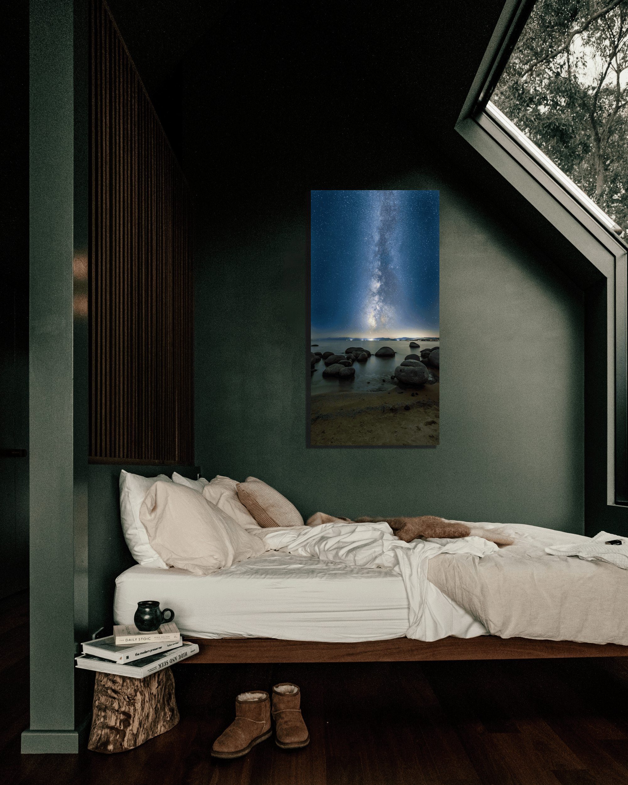 A bedroom alcove showcases a photograph of the Milky Way above Lake Tahoe.
