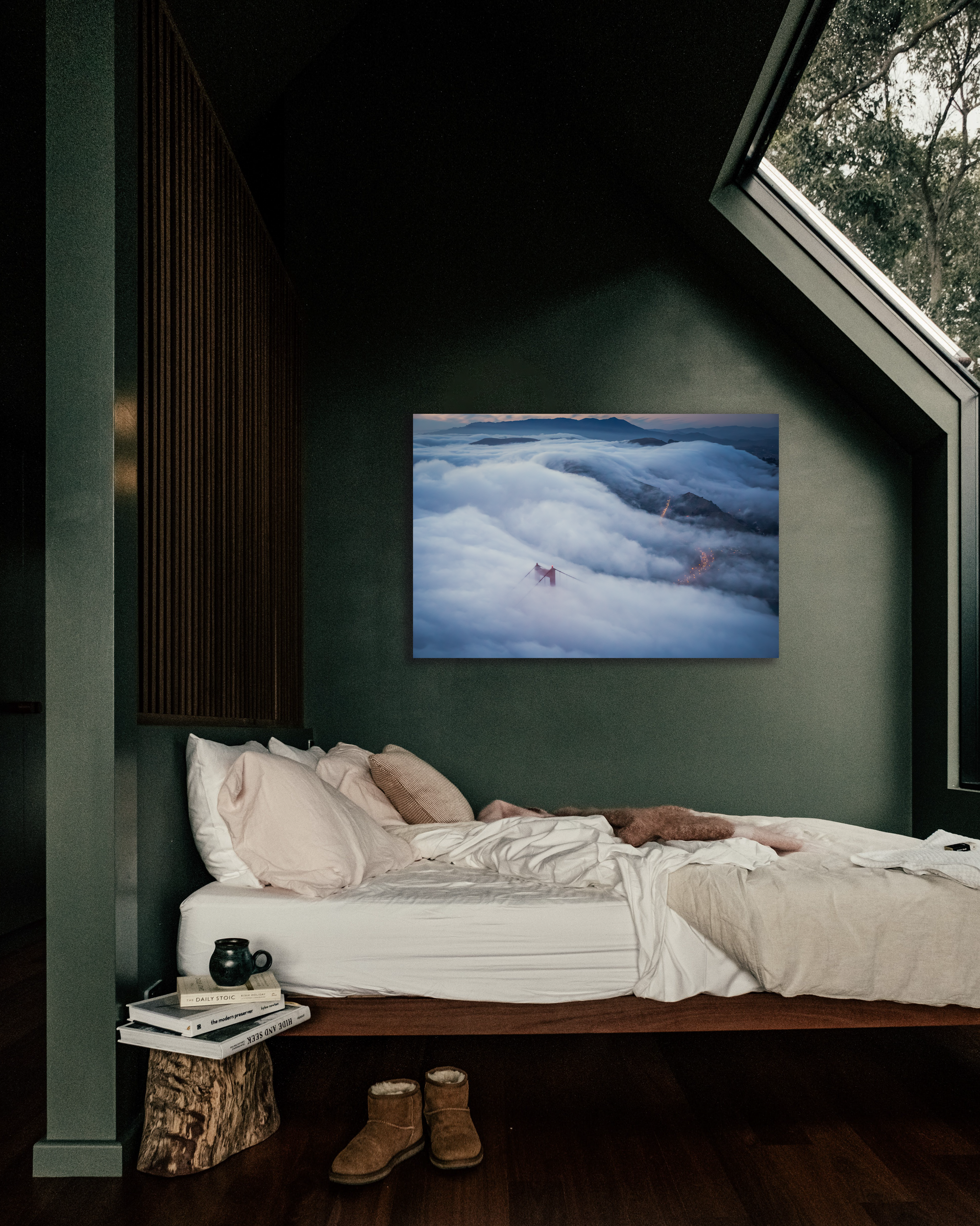 A green walled bedroom with a foggy image of the Golden Gate Bridge hidden fog on the wall.