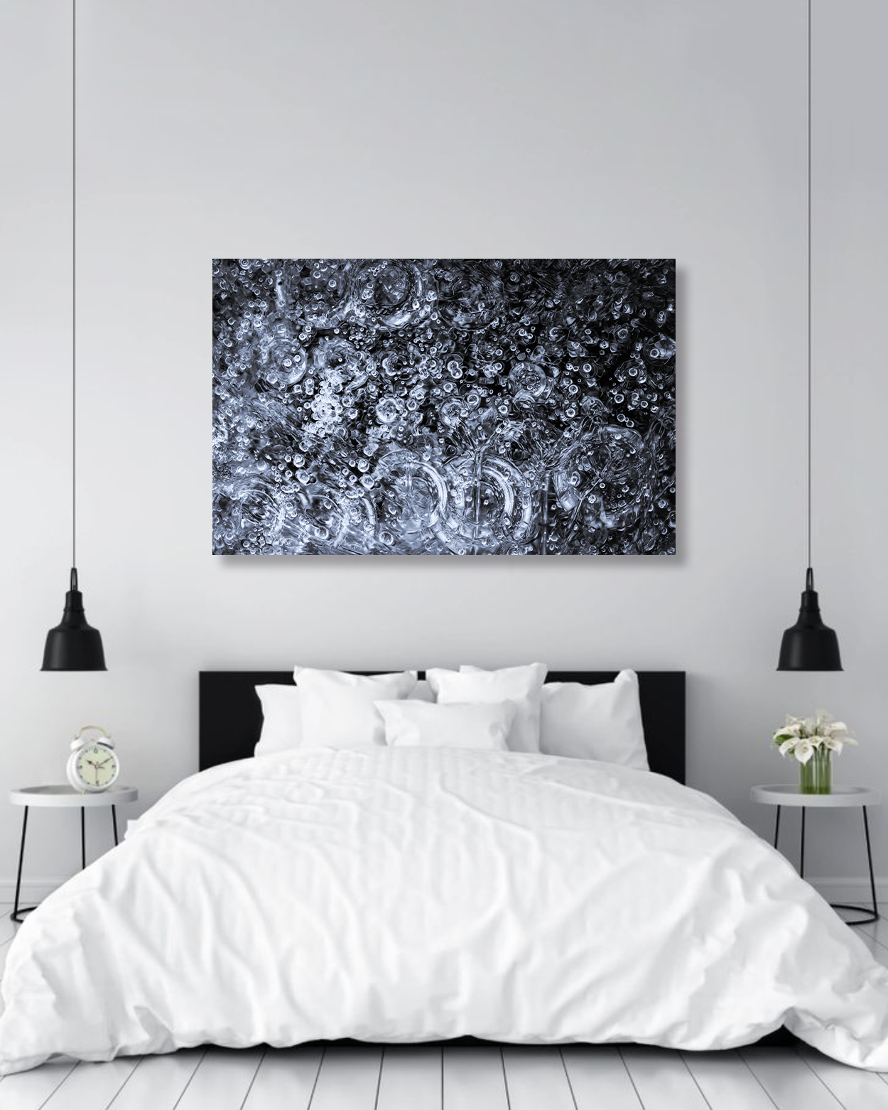 A microscopic image of frozen bubbles hang above a king sized bed.