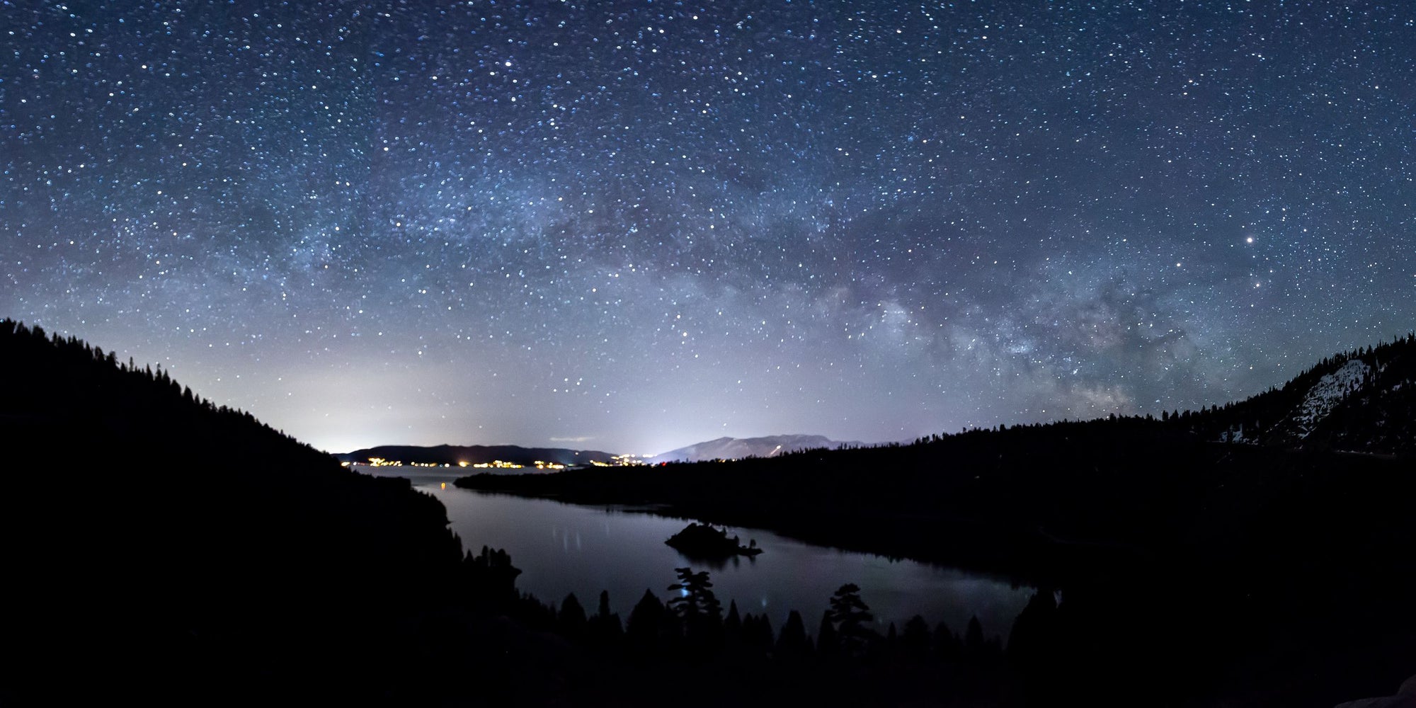 The Milky Way arches high above Lake Tahoe's Emerald Bay.
