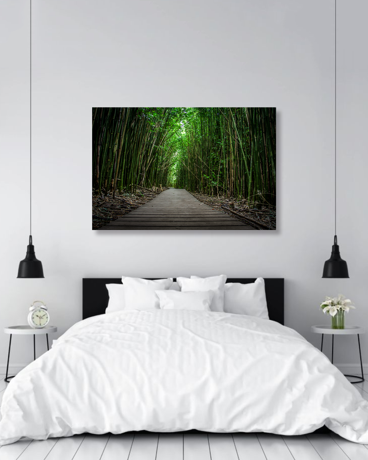 A photography print with a bamboo lined walkway hanging on a wall.